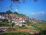Kathmandu Valley 2 Kirtipur 01 Kiritpur On Hill And Srikirti Vihara The small town of Kirtipur is on two hills with a saddle between them, 5km southwest of Kathmandu. Srikirti Vihara, a Thai Buddhist temple, is visible on the edge of the village.